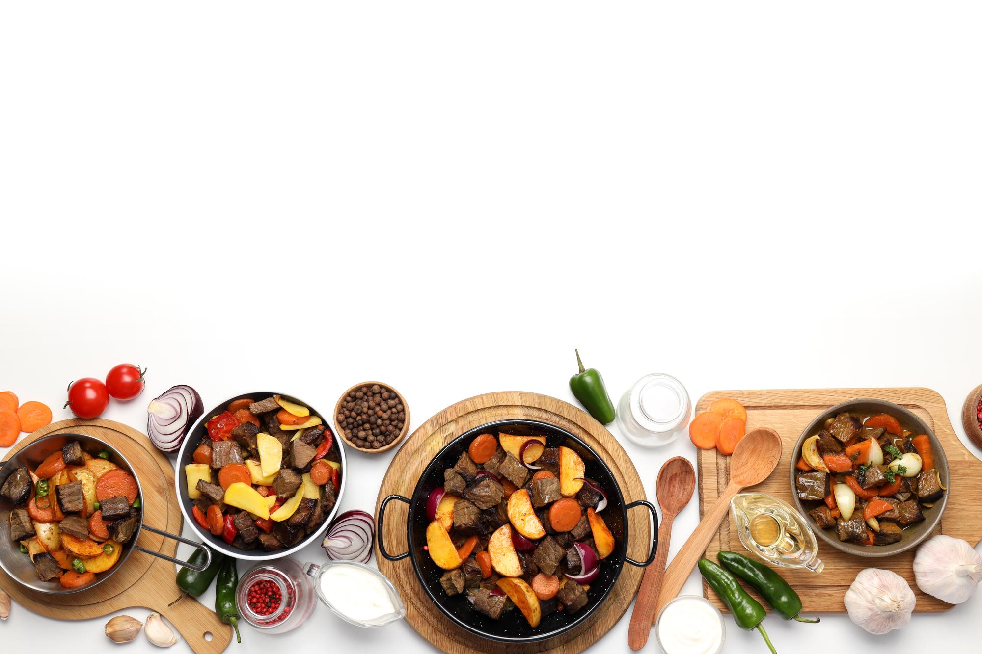 assorted plated dishes on a wooden table